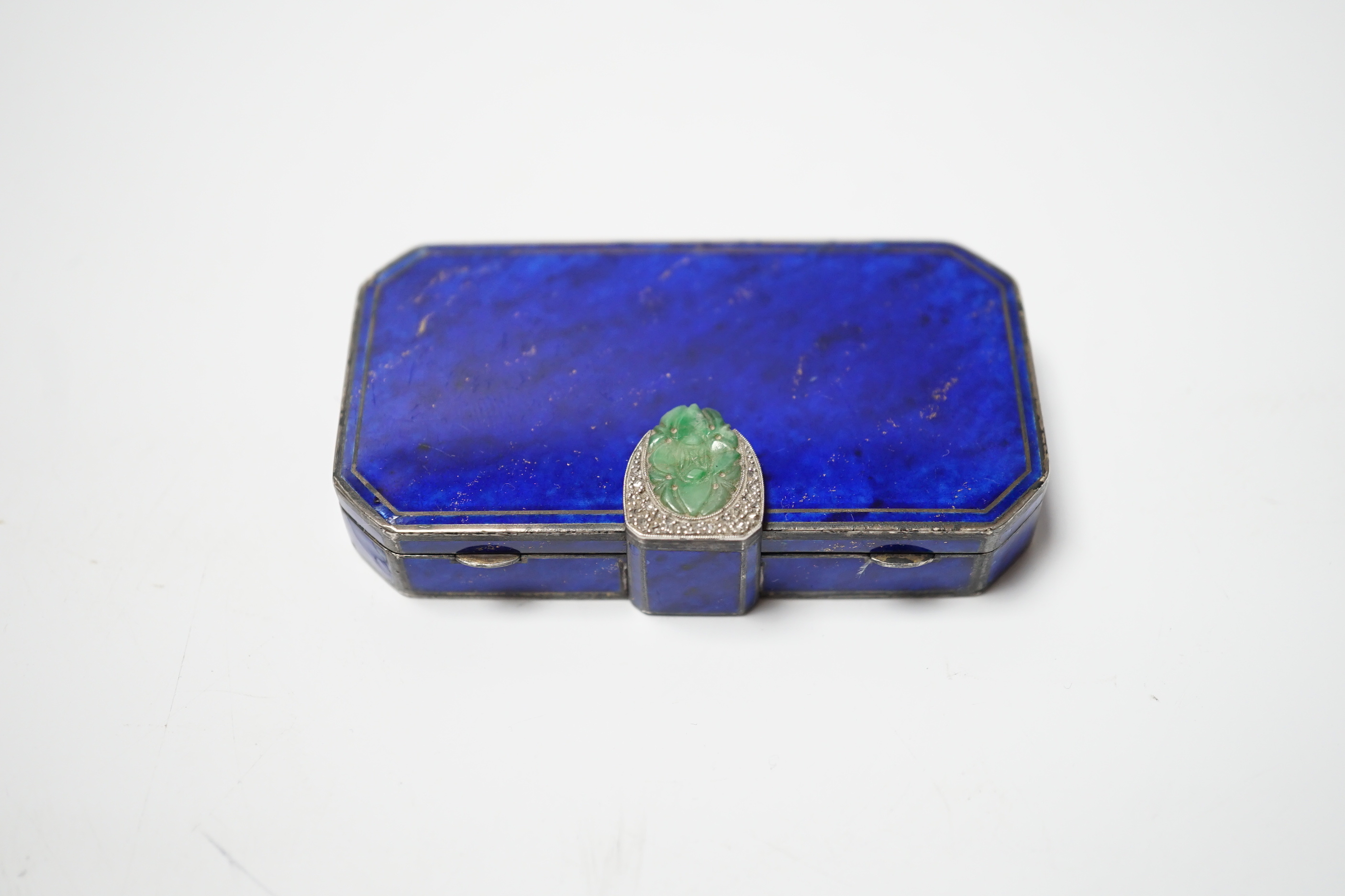 A 1920's French silver, enamel, jade and rose cut diamond chip set minaudiere, import marks for Tiffany & Co, London, 1926, of rectangular form with canted corners, 73mm (a.f.)